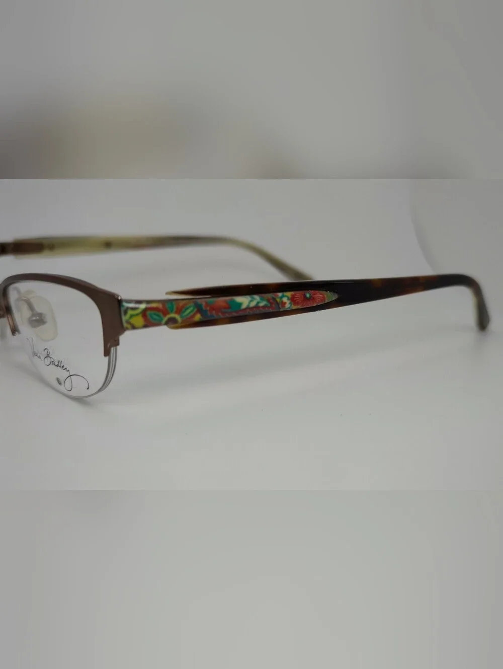 Lola. Vera Bradley Women's Semi-Rimless Glasses in Brown Matte. Small.